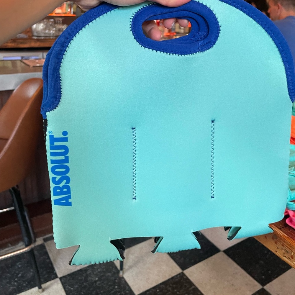 Light blue Absolut koozie drink holder
